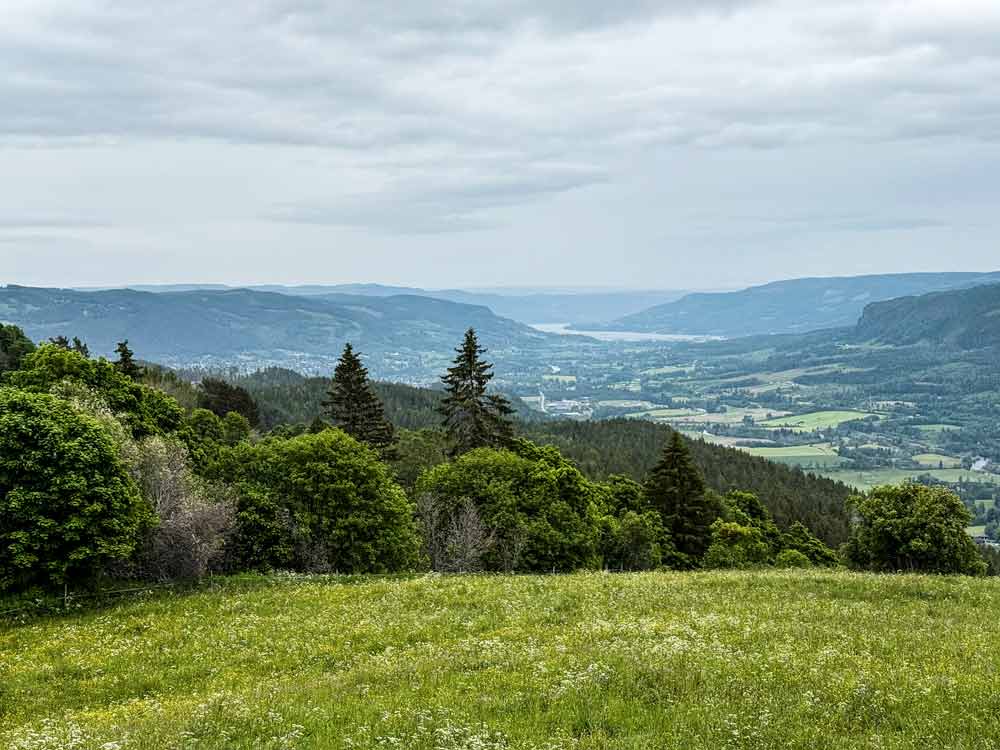 Scenic overlook from Hogne church grounds in Nordsinni, Nordre Land. View is to the southeast overlooking Dokka and on to Søndre Land and the Randsfjorden.